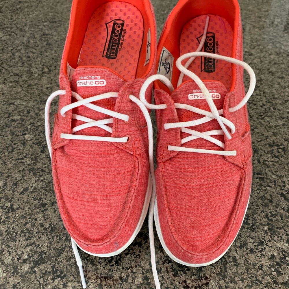 Size 8.5 Skechers red sneakers.